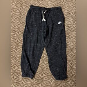 Nike woman Dark Gray Joggers. Short style with speckles.